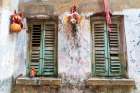 India, West Bengal, Kolkata, College Square. Weathered wall and window shutters. Art Print